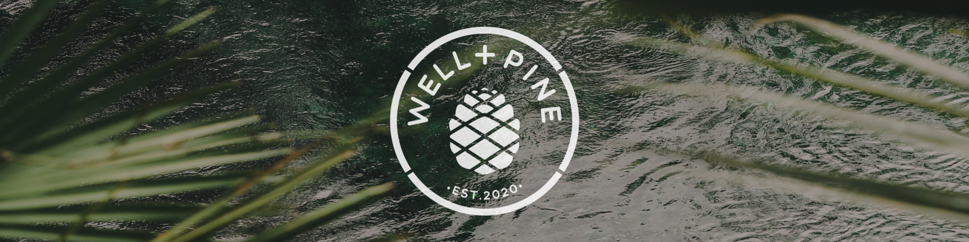 well + pine logo over a picture of green water and plants